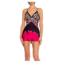 MORPHEW COLLECTION Abito in twill di seta nero e rosa con stampa floreale leopardata Made Fr