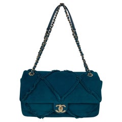 Chanel suede goat skin and gold tone metal dark blue flap bag