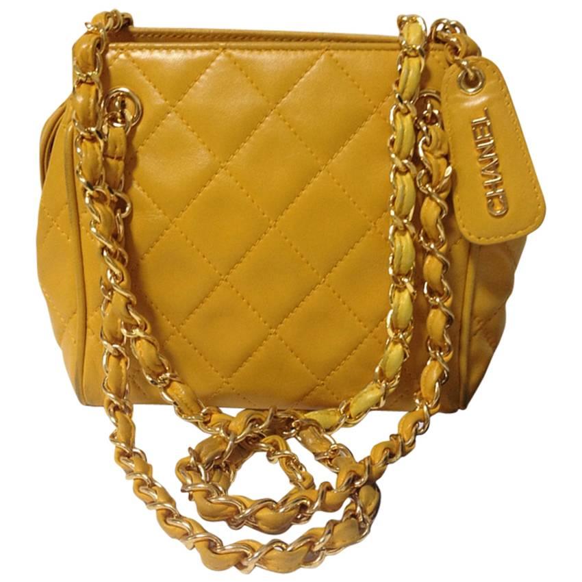Vintage CHANEL lucky yellow color, lambskin classic chain mini shoulder bag. For Sale