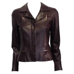 Giacca in pelle Chanel bordeaux con inserti in oro rosa