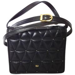 Retro Valentino Garavani black leather shoulder purse with triangle stitch