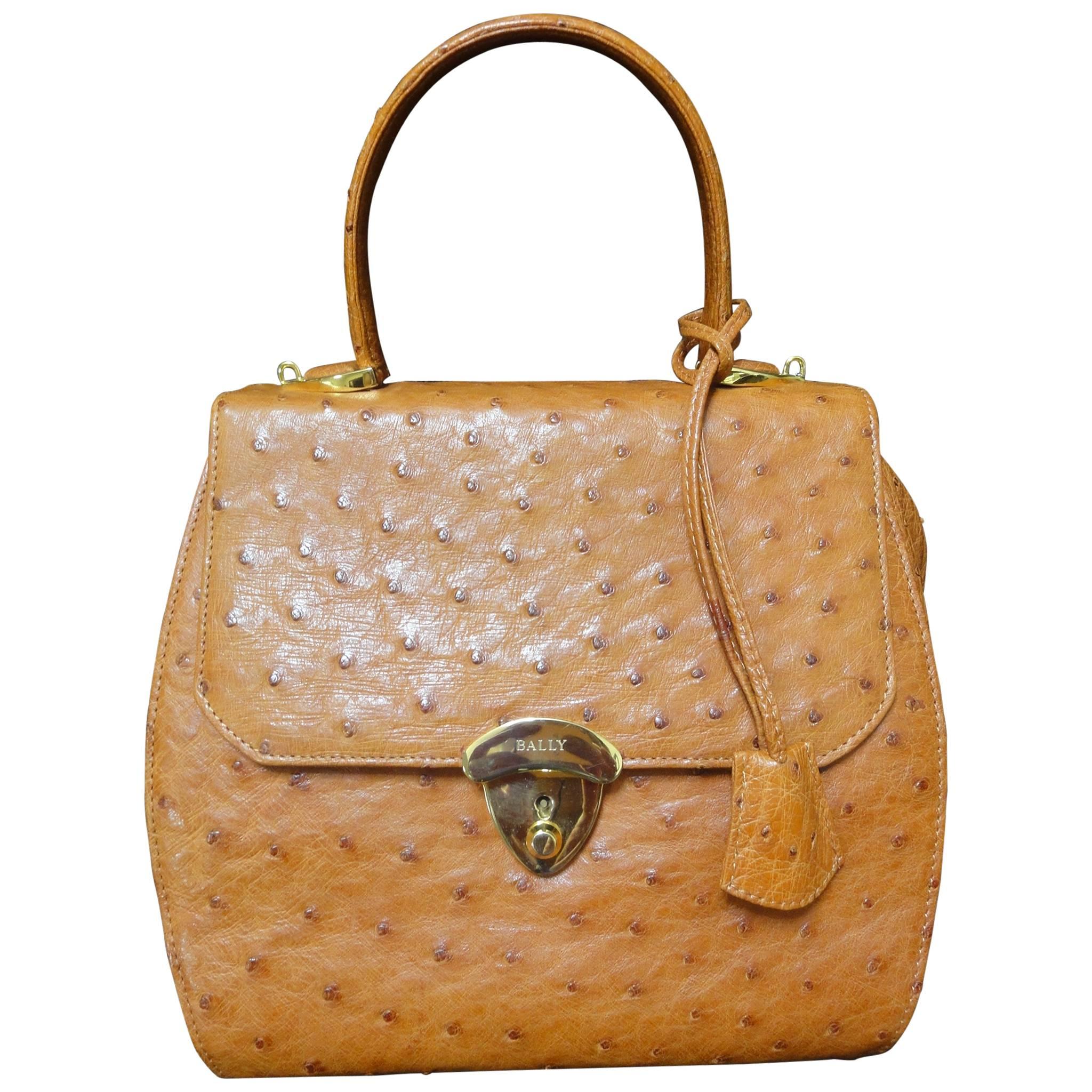 MINT. Vintage BALLY genuine ostrich leather orange brown handbag with strap. For Sale