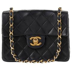 1980s Chanel Black Quilted Lambskin Vintage Mini Flap Bag
