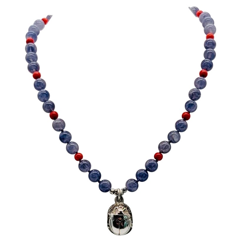 A.Jeschel Sterling silver Scarab supended from an Iolite and coral necklace For Sale