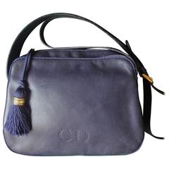 Vintage Christian Dior navy lamb leather shoulder bag with fringe. Classic bag