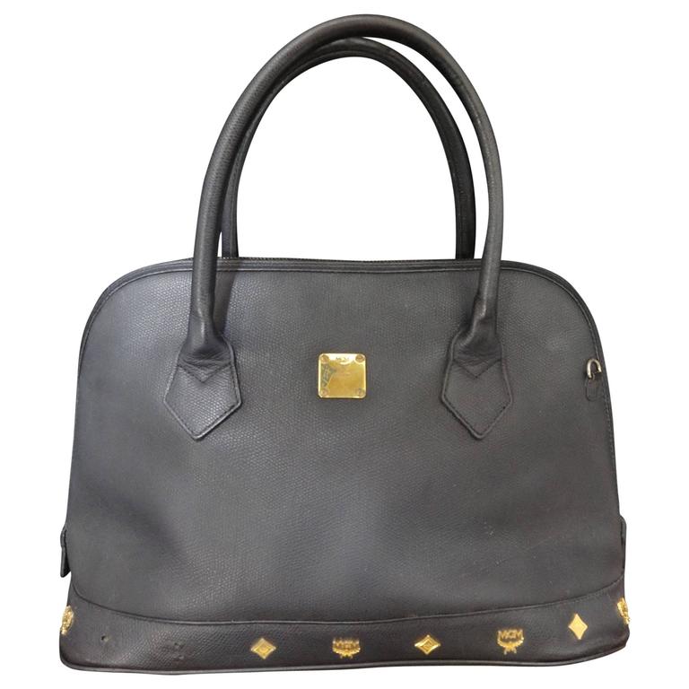 Mcm Black Visetos Pvc Handbag For At 1stdibs Vintage Mcm Black Bolide Style Bag With Gold Tone Charms By Michael Cromer