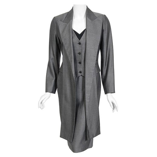 2006 ALEXANDER MCQUEEN black runway coat with large neck tie at 1stDibs