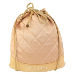 Chanel Pink Quilted Satin Crystal Logo Drawstring Backpack 830cas21