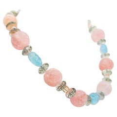 A.Jeschel Stunning necklace with Carved Rose Quartz and Topaz gemstones.