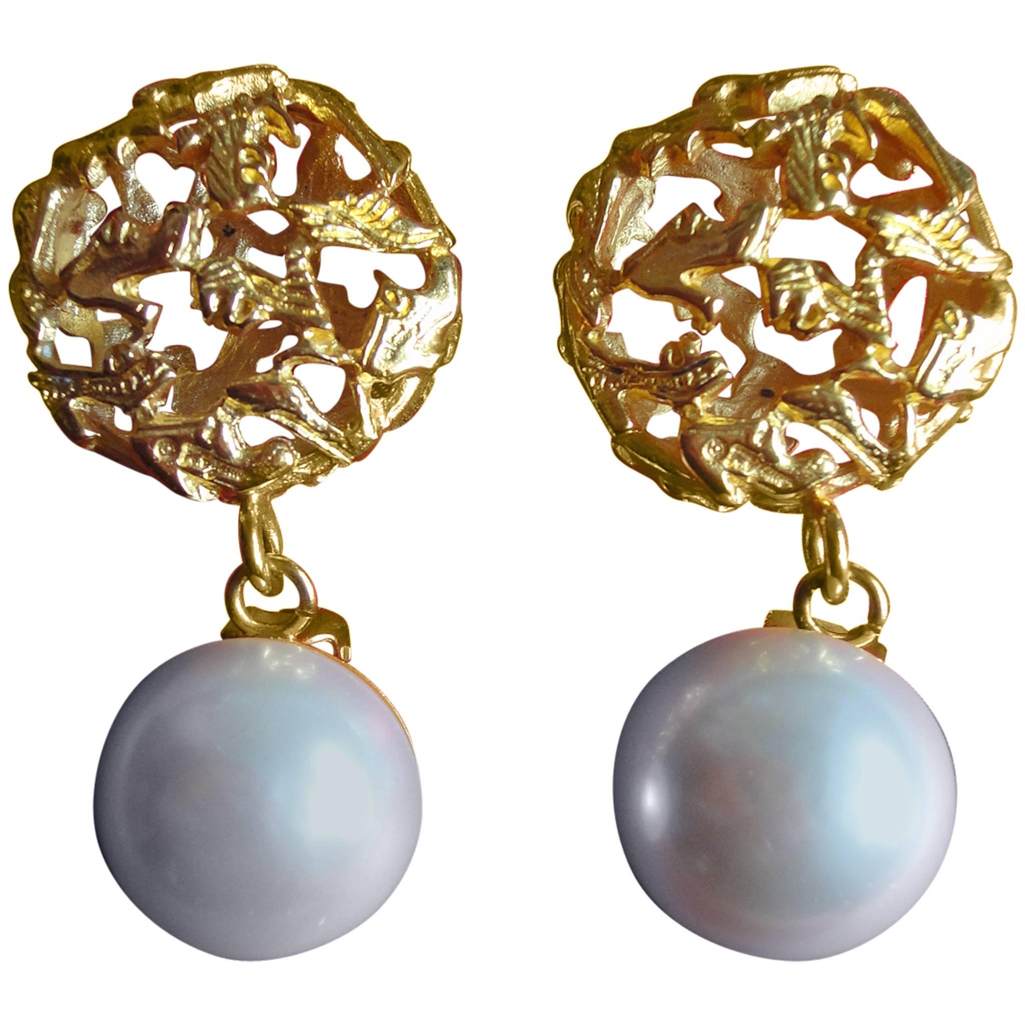 Vintage Salvatore Ferragamo white faux pearl earrings with golden shoe design  For Sale