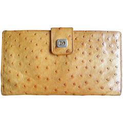 Vintage GUCCI tanned brown genuine ostrich leather wallet with gold tone GG logo