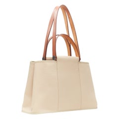 HERMES Toile H Cabag Elan Etoupe canvas tan leather expandable shoulder tote bag