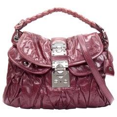 Miu Miu Coffer Leather Satchel (SHG-30901) – LuxeDH