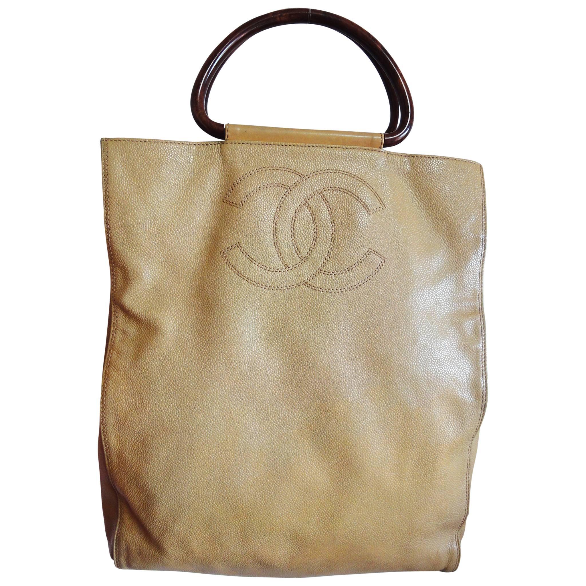 Vintage CHANEL beige caviar large shopper, tote bag with CC stitch mark.