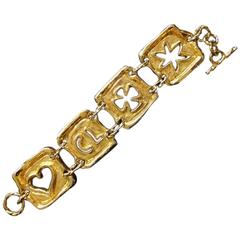 Vintage Christian Lacroix gold tone extra large statement bracelet with motifs
