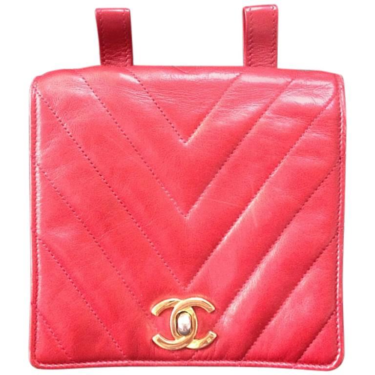 Vintage CHANEL lipstick red lambskin pouch with golden CC closure in chevron V.