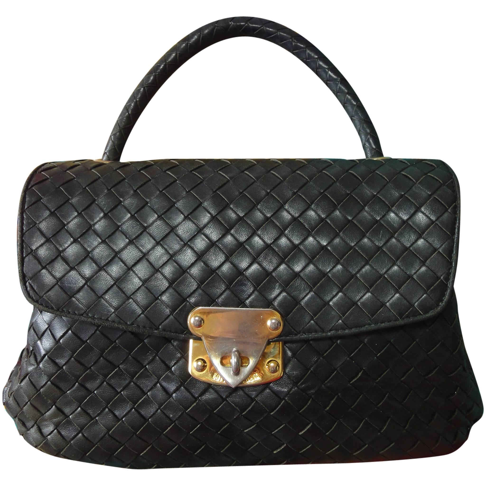 Vintage Bottega Veneta intrecciato woven leather handbag purse in dark green.