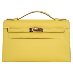Hermes Kelly Pochette Tasche Limetten Clutch mit Goldbeschlägen aus Swift Leder
