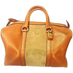 Vintage 1970s Christian Dior Bagages camel brown mini duffle purse. Unisex bag