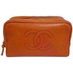 Vintage CHANEL orange caviar leather travel cosmetic, jewelry, toiletries pouch