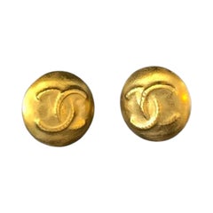 1990s Vintage CHANEL Gold Toned CC Impression Clip On Earrings 