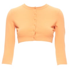 Neu ALAIA Signatur Cropped Stretch-Strickjacke mit Knopfleiste in Peche Orange FR38 S