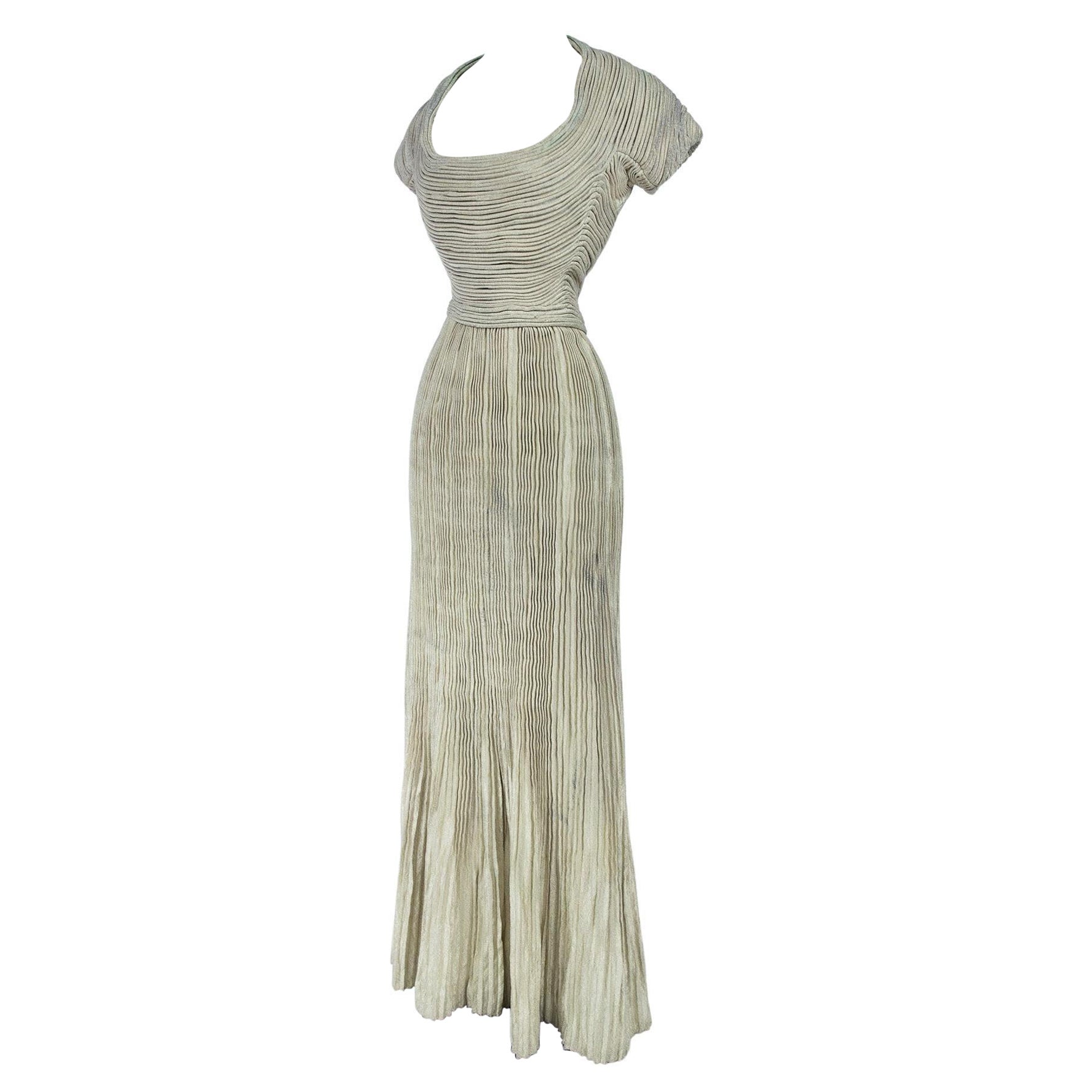 A Silver Lamé Evening Dress by Lucile Manguin - France Haute Couture Circa 1940 For Sale