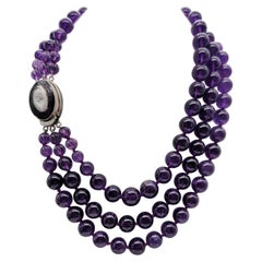 A.Jeschel Natural Amethyst Triple Layer Bead Necklace with a signature clasp.