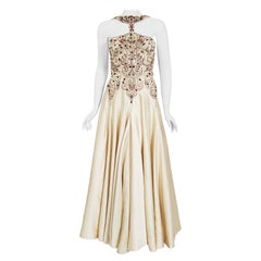 Robe d'archive en soie ivoire perlée portée par Madonna en 1996 dans le cadre du film "Evita".