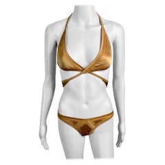 Gucci P/E 2005: costumi da bagno bikini a due pezzi con pannelli trasparenti e ritagliati