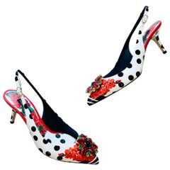 Dolce & Gabbana Weißer Polkadot
Rote Taormina Schuhe mit Absatz aus Geranienmuster