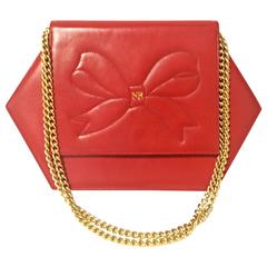 Vintage Nina Ricci red leather hexagon shape clutch shoulder bag with large bow