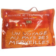 1990s. Hermes a rare transparent Vintage orange vinyl Kelly bag Japan Limited.
