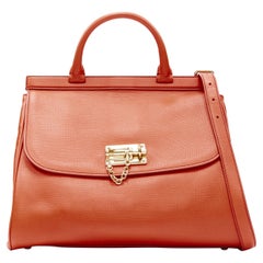 DOLCE GABBANA Monica - Sac à bandoulière à rabat en cuir orange avec fermeture à glissière dorée