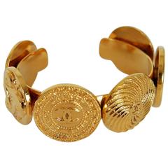 1990's Chanel Rare Novelty-Logo Button Charms Medallion Gold Cuff Bracelet 1