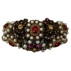 Dolce & Gabbana
Diadème avec cristaux multicolores
bandeau clouté