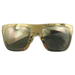 Dolce & Gabbana Sonnenbrille mit
vergoldete Farbverlaufsgläser