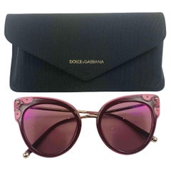 Pink cat-eye sunglasses from Dolce
& Gabbana Eyewear
