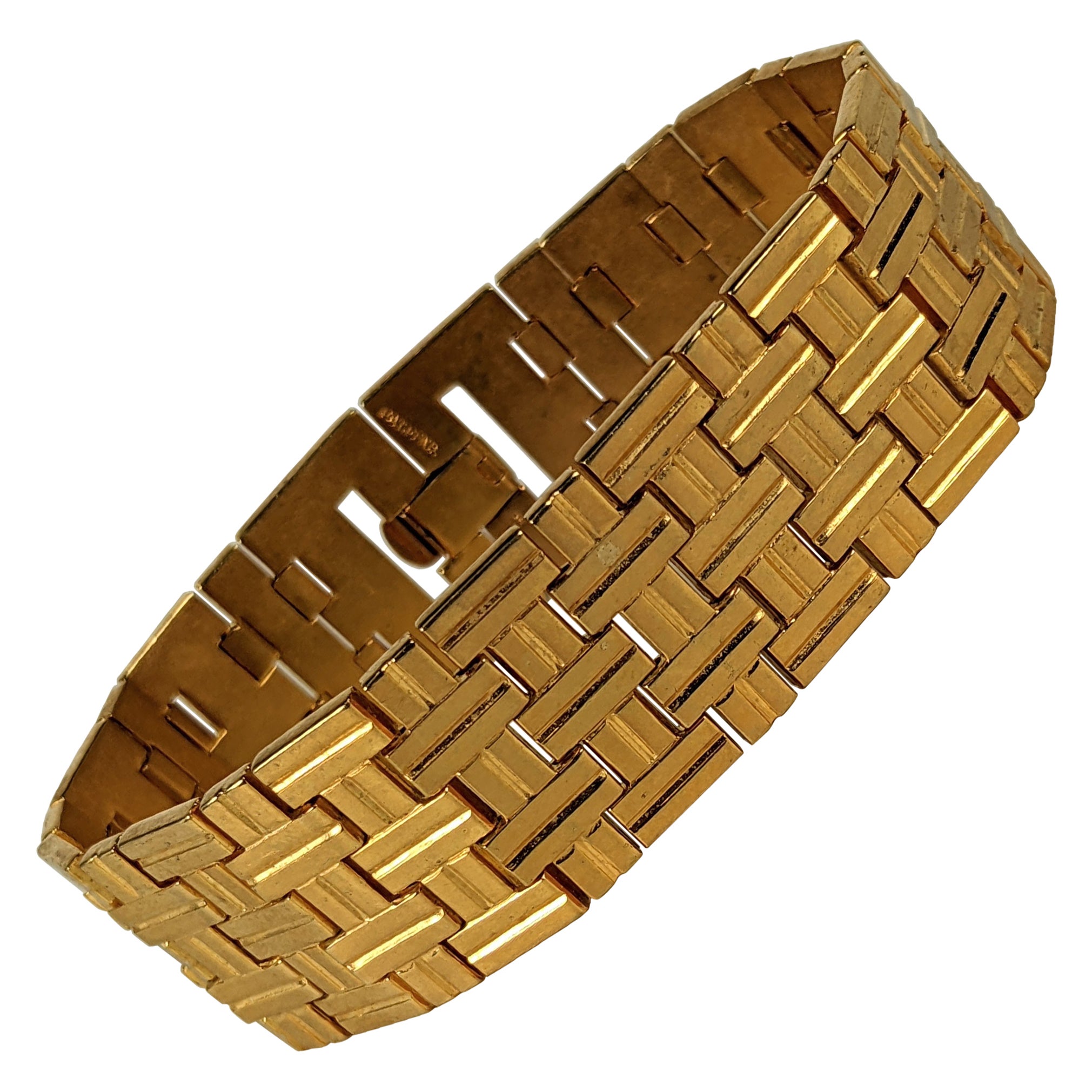 Bracelet à maillons souples dorés Trifari, Alfred Phillipe