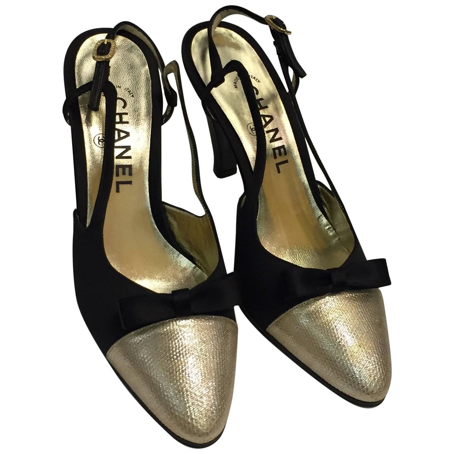 gold slingback pumps