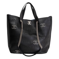 CHANEL black leather 2019 PERFORATED LOGO EYELET SMALL SHOPPING Bag