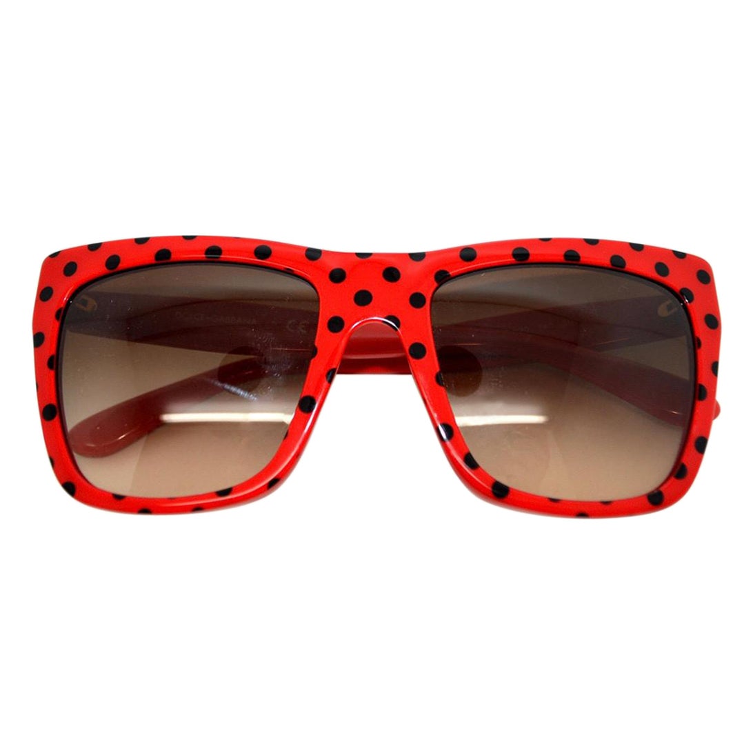 Dolce & Gabbana sunglasses in red
plastic with black dots