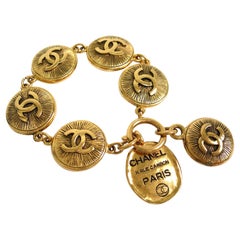 Chanel Vintage Gold CC Rue Cambon Coin Medallion Charm Bracelet