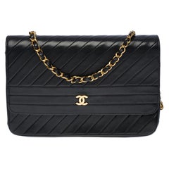 Chanel Classic shoulder bag in black quilted leather with herringbone , GHW