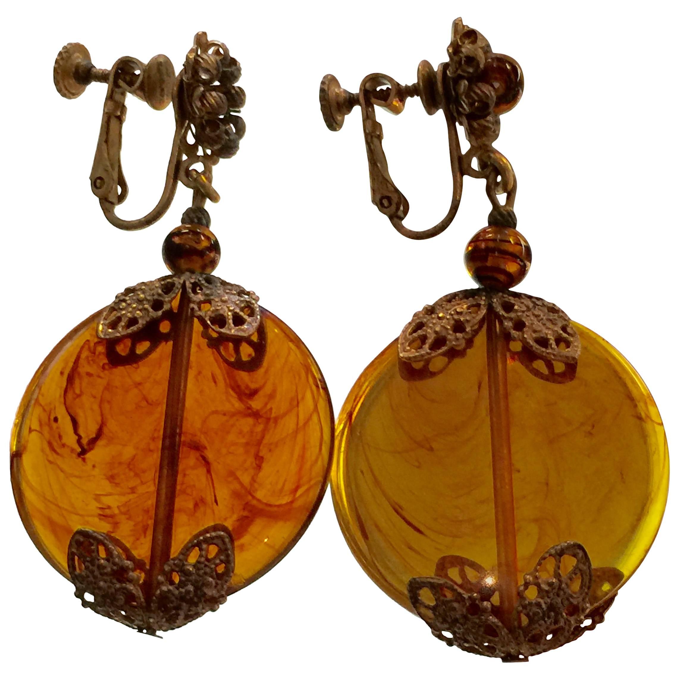1960s MIRIAM HASKELL Mottled Amber Glass Disc Drop Earrings Goldtone Filigree
