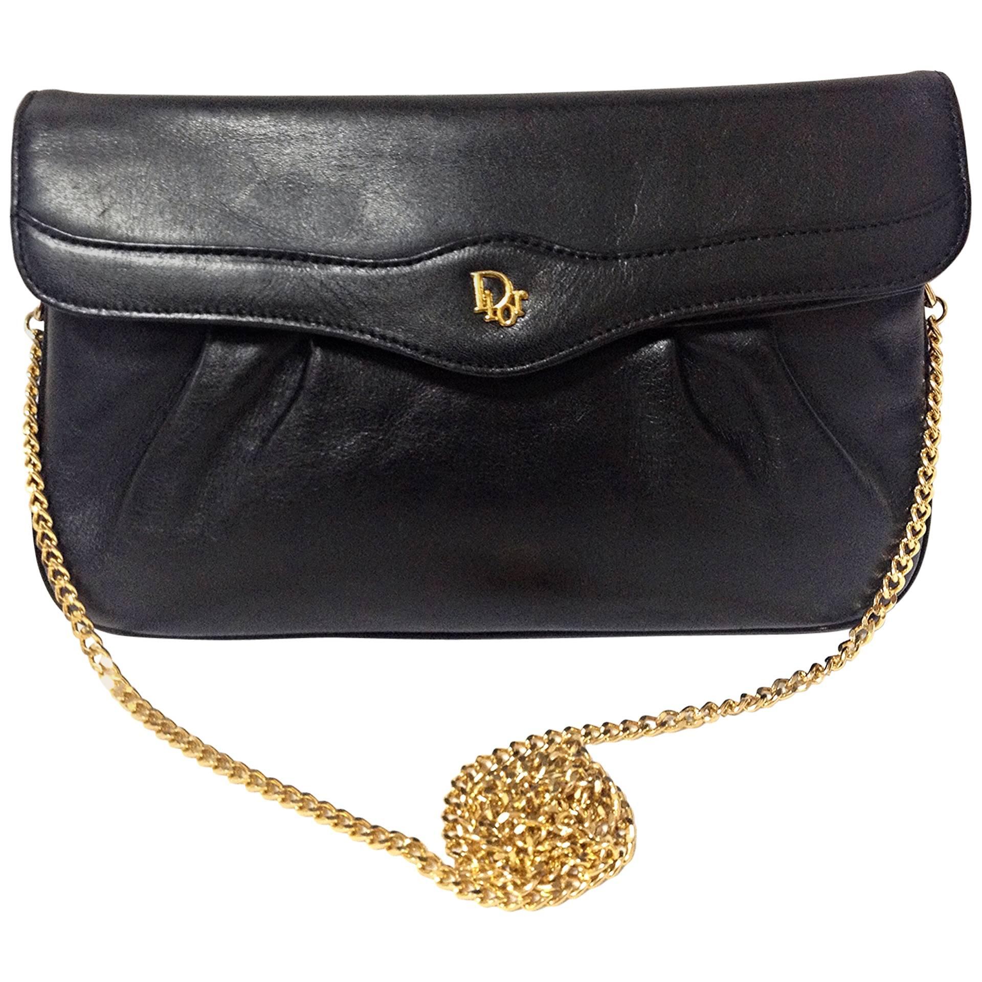 Vintage Christian Dior Vintage black leather clutch purse, mini bag, with chain.