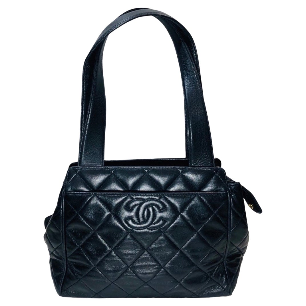 Vintage Chanel Embossed CC Logo  Navy Quilted Lambskin Shoulder bag   For Sale