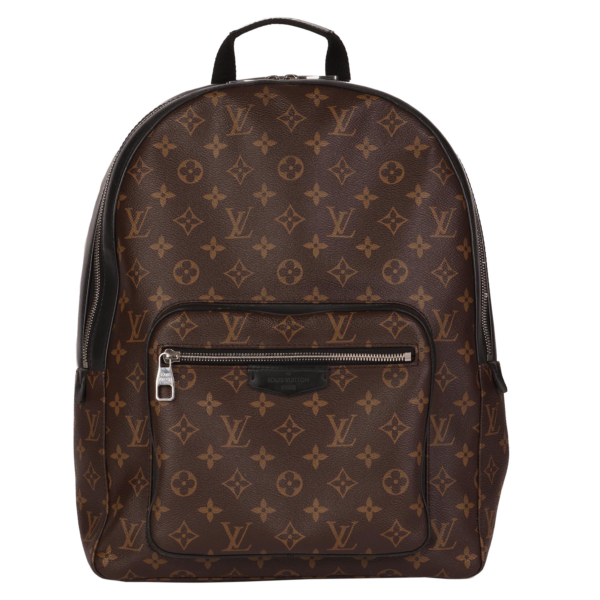 Man with brown Louis Vuitton backpack and black padded jacket