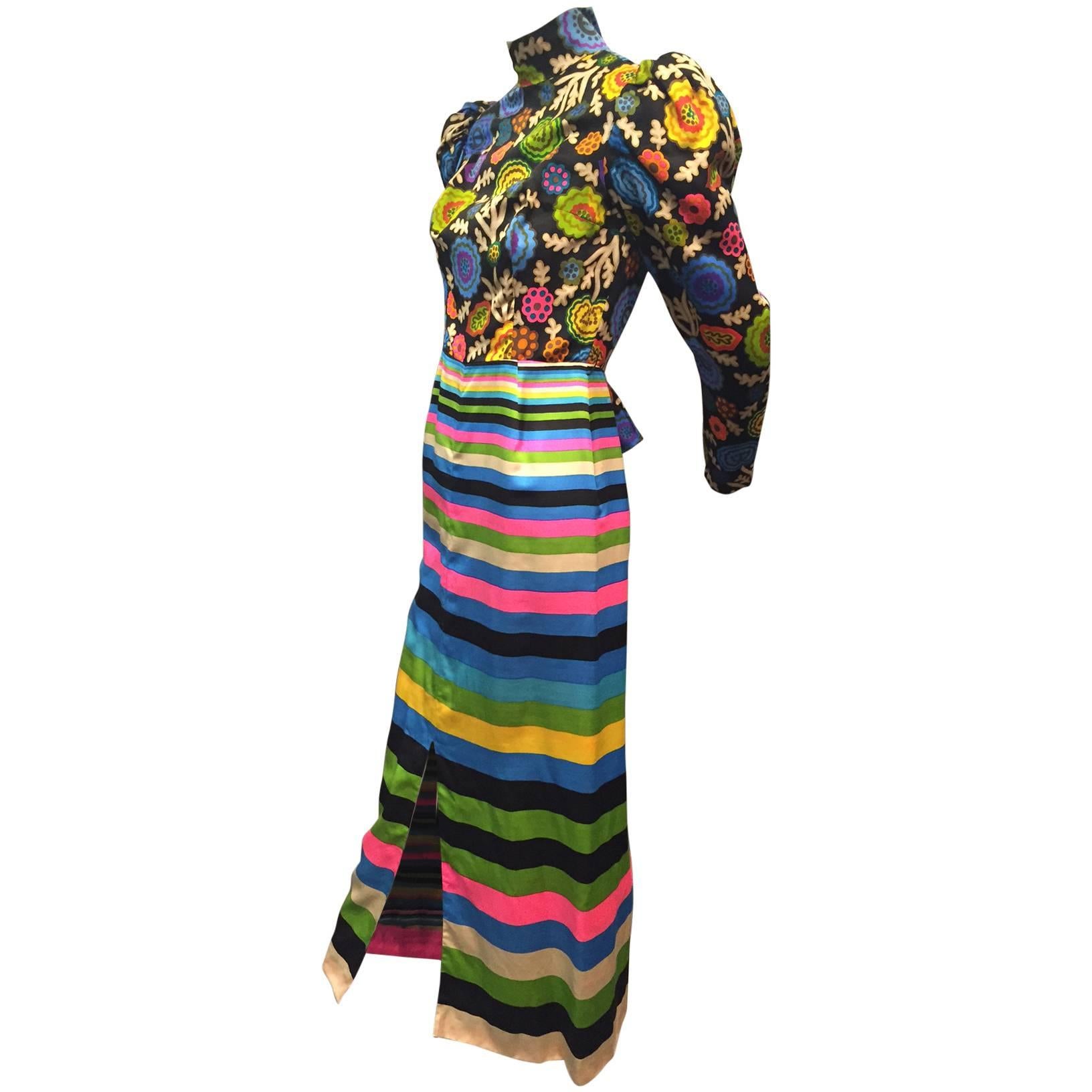 A fabulous 1960s Lanvin polished cotton maxi dress in vivid stripes and florals:  Structured leg-o-mutton sleeves with zippered cuffs, back zipper and center front slit. Missing original belt. 