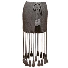 Knitted button up skirt with extra long tassels, c. 1990s 6
